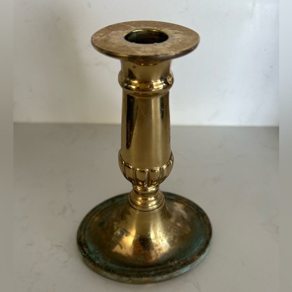 Antique English Brass candlestick holder rich with patina and oblong base